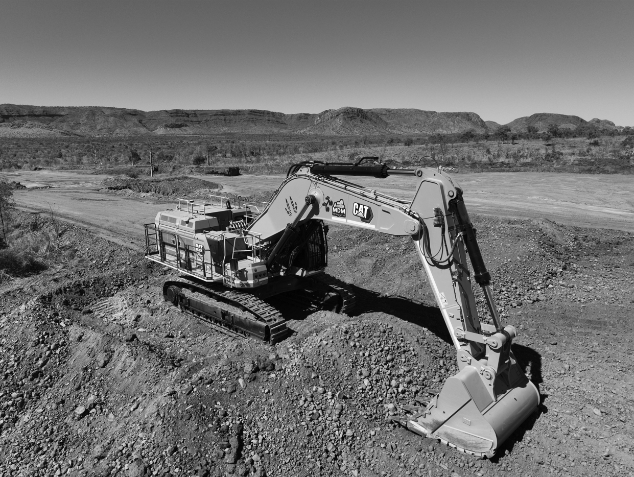 An excavator working on the land for Earthworks/Machine Control/ Volumetric Surveys directed by Tuath Surveys/Tuath Nuá